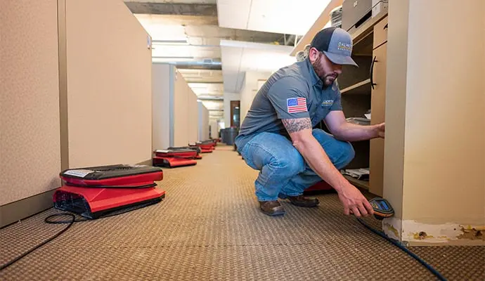 Restoration crew drying a Southwest Fort Worth home with air movers